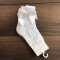 Short summer socks for a girl with a ribbon in white